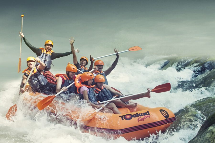 Tourists enjoy river rafting at Ayung river Bali