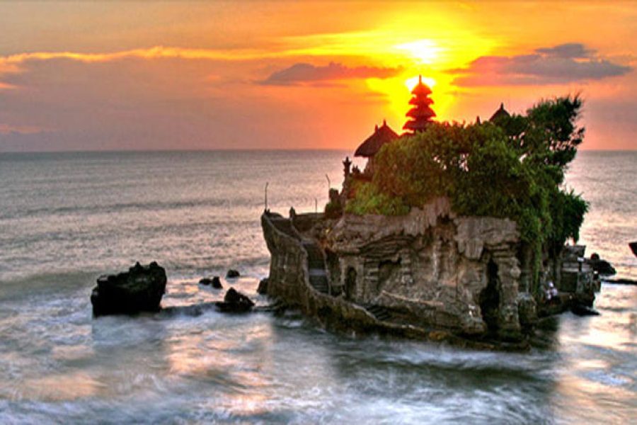 A photo of the Tanah Lot Temple in Bali, Indonesia, with the ocean in the background