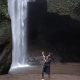Adit Sarin posing in front of Vertical waterfall at Goa Rajo.