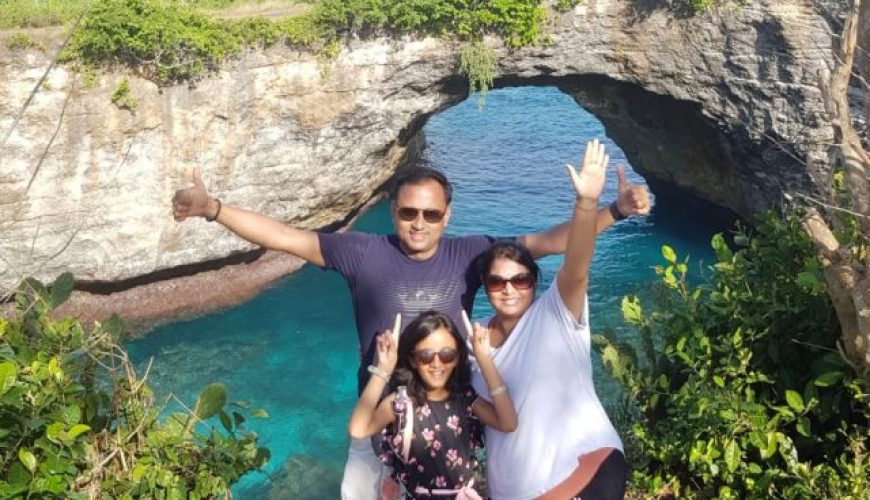 A family of tourists enjoying at Broken beach of Nusa Penida Island.