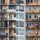 Orange building with balconies and clothes hanging in Batumi city