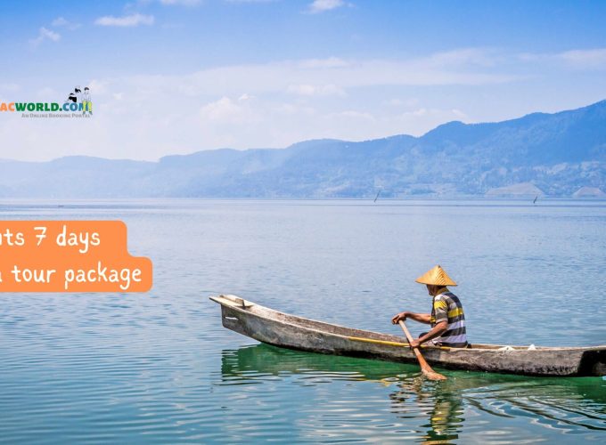 6 nights 7 days Sumatra tour package - A localite enjoying a serene boat ride on Lake Toba in the heart of Sumatra.