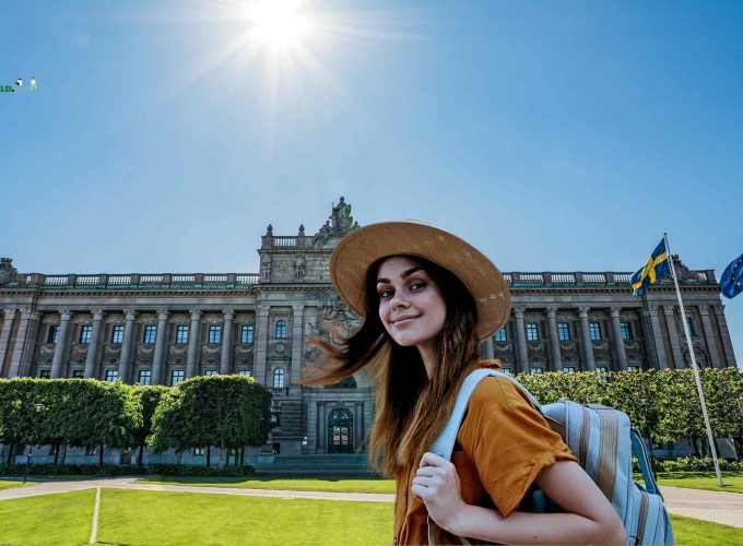 Tourist from Lestacworld poses in front of Stockholm's Parliament building, showcasing the city's iconic architecture.