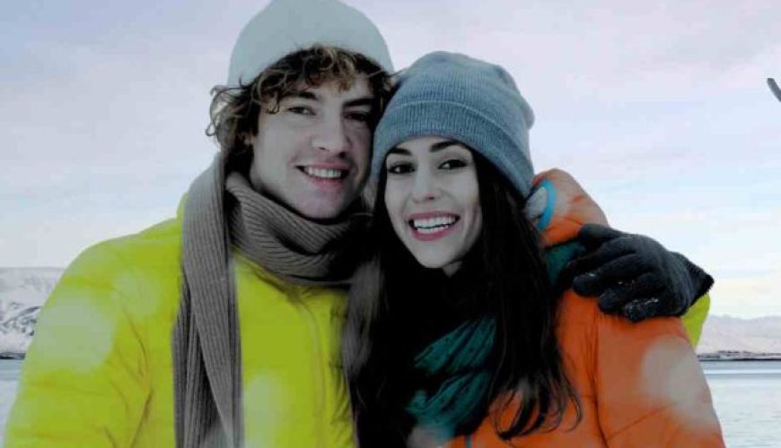 Couple standing in front of Sun Voyager sculpture in Reykjavík during the 8 Nights, 9 Days Iceland, Norway, Sweden & Finland Tour Package.