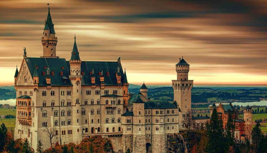 Neuschwanstein Castle surrounded by lush greenery. 10 Best Germany tour packages