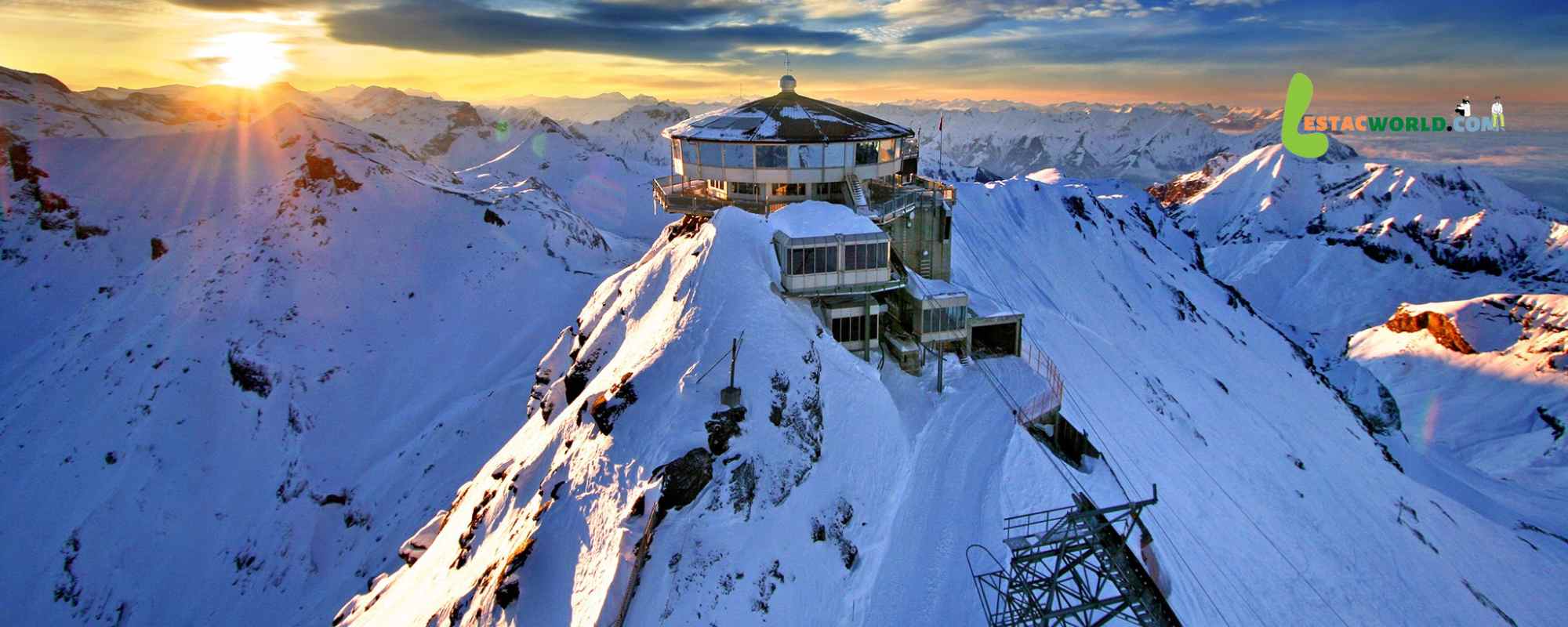 A panoramic view of the Jungfrau Region in Switzerland during a sunny day in August.