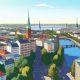 An animated aerial view of Helsinki cityscape during the summer season, showcasing vibrant buildings, lush green parks, and scenic waterfronts.