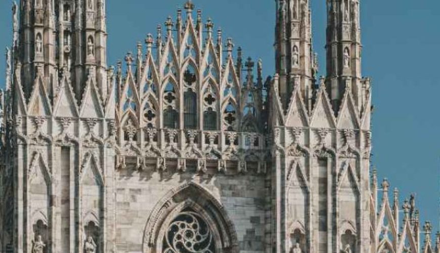 A breathtaking view of the Duomo di Milano, the iconic cathedral in Milan, Italy, with its intricate Gothic architecture and spires.