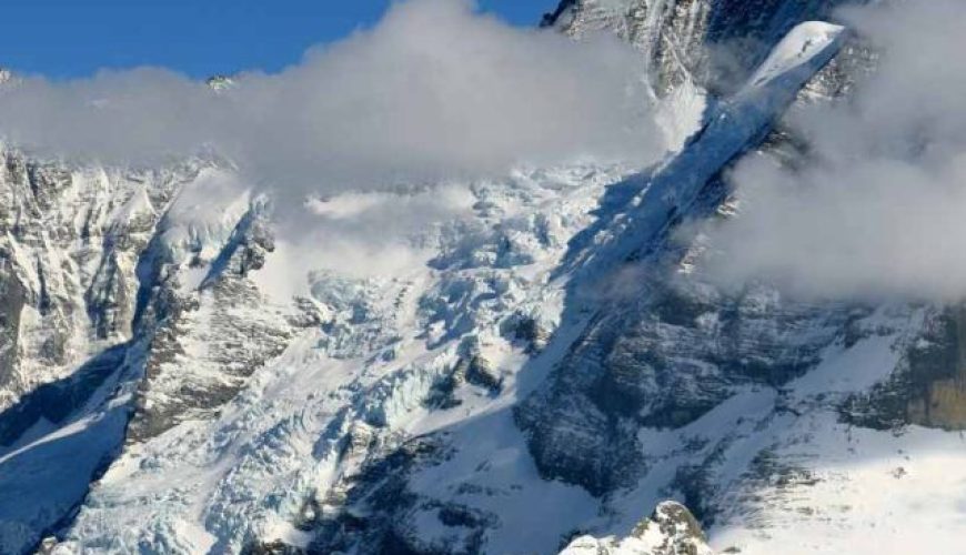 Snow-covered peaks of the Interlaken Alps, a highlight of the 8 nights 9 days Switzerland tour package.