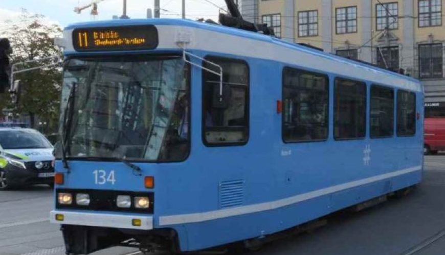 Sky blue tram train in Oslo, part of the Best Scandinavian tour package for Senior Citizens