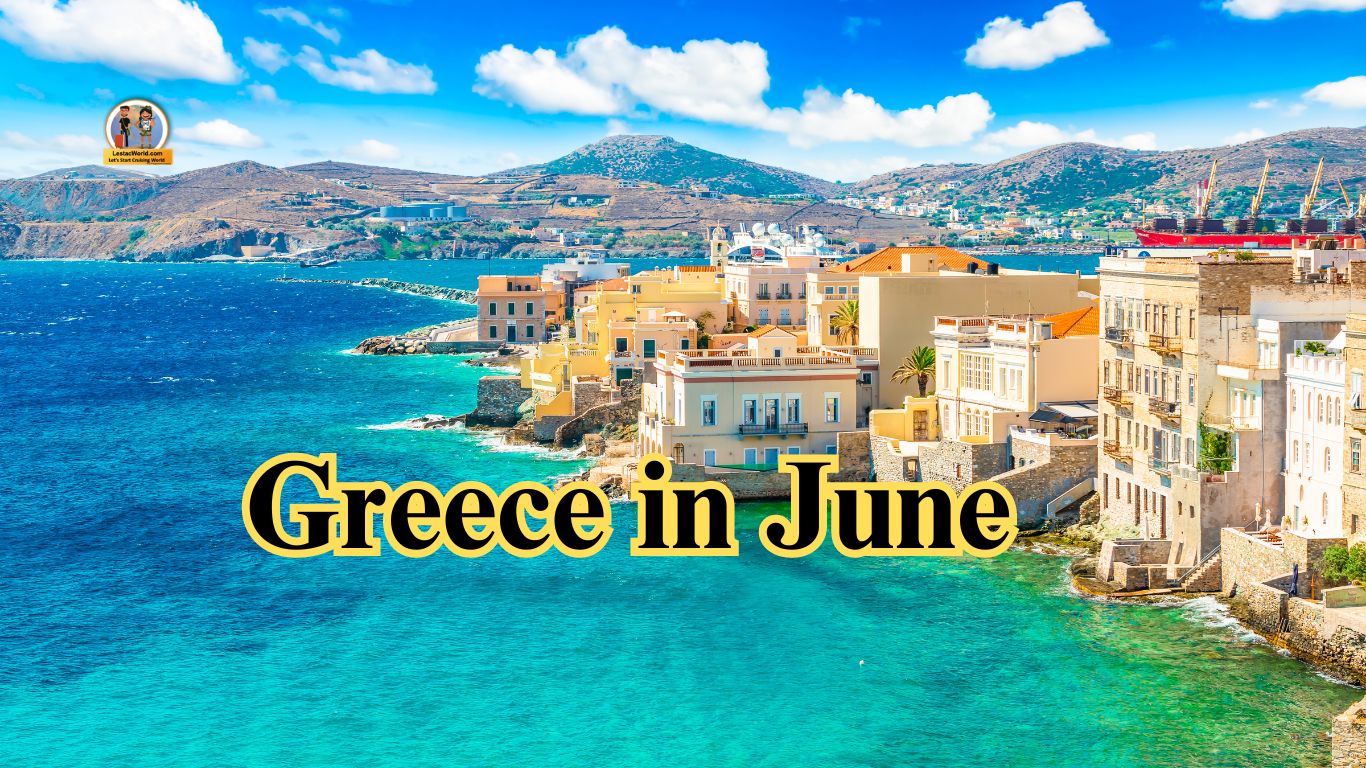 Aerial view of white houses with blue roofs built on the cliffs of Santorini, overlooking the blue waters of the Aegean Sea.