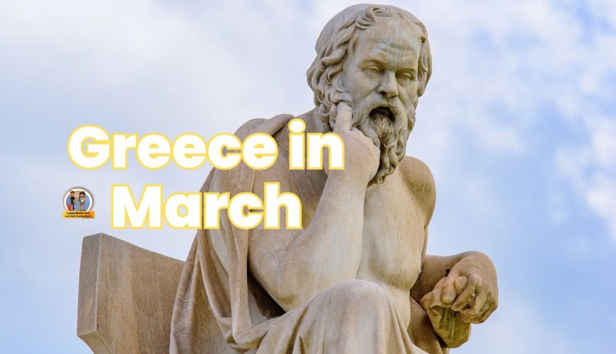 A statue of Socrates against a backdrop of ancient ruins in Greece.