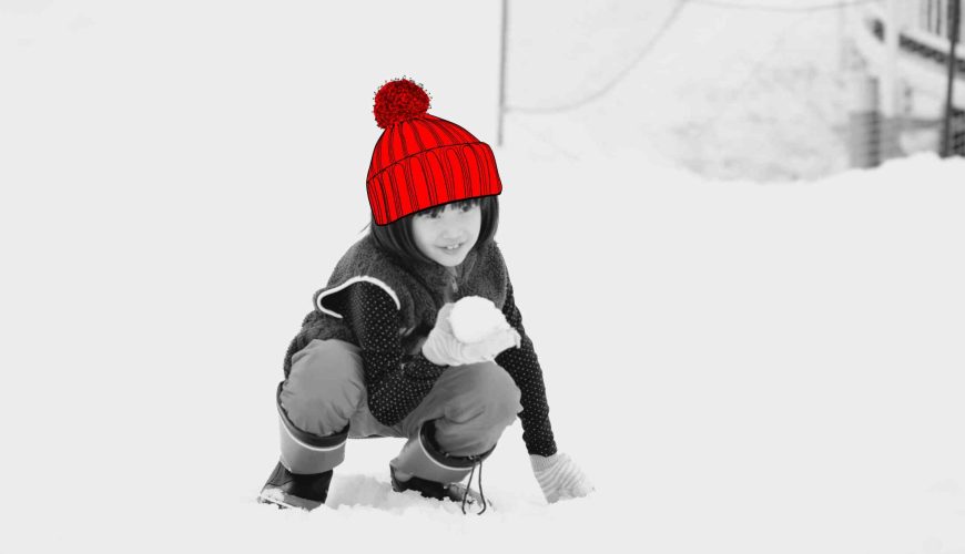 A young girl named Pamela, daughter of Ling Zhang and Ron, joyfully playing in the snow in Finland.