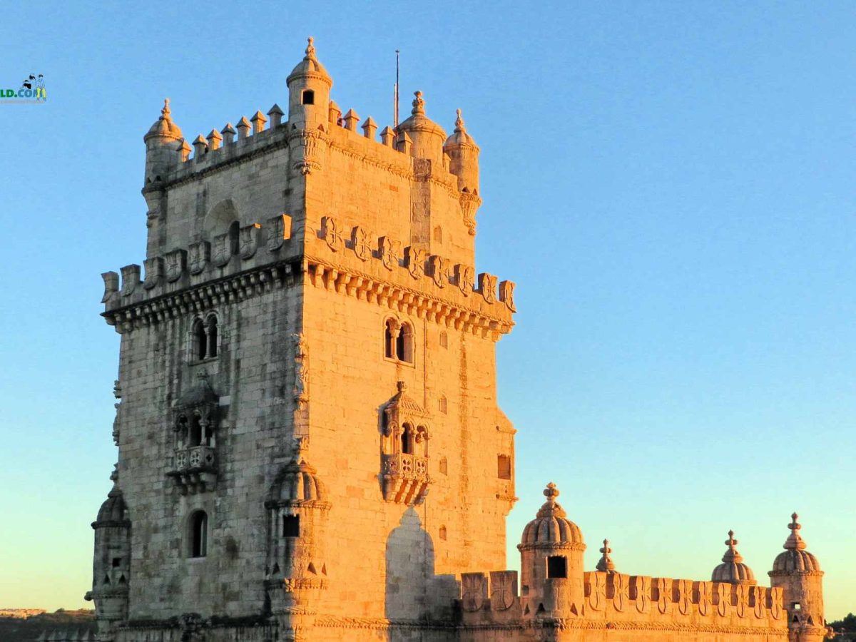 BelƩm Tower in Lisbon, Portugal, with a bright blue sky and calm waters, a must-visit destination for travelers wondering,